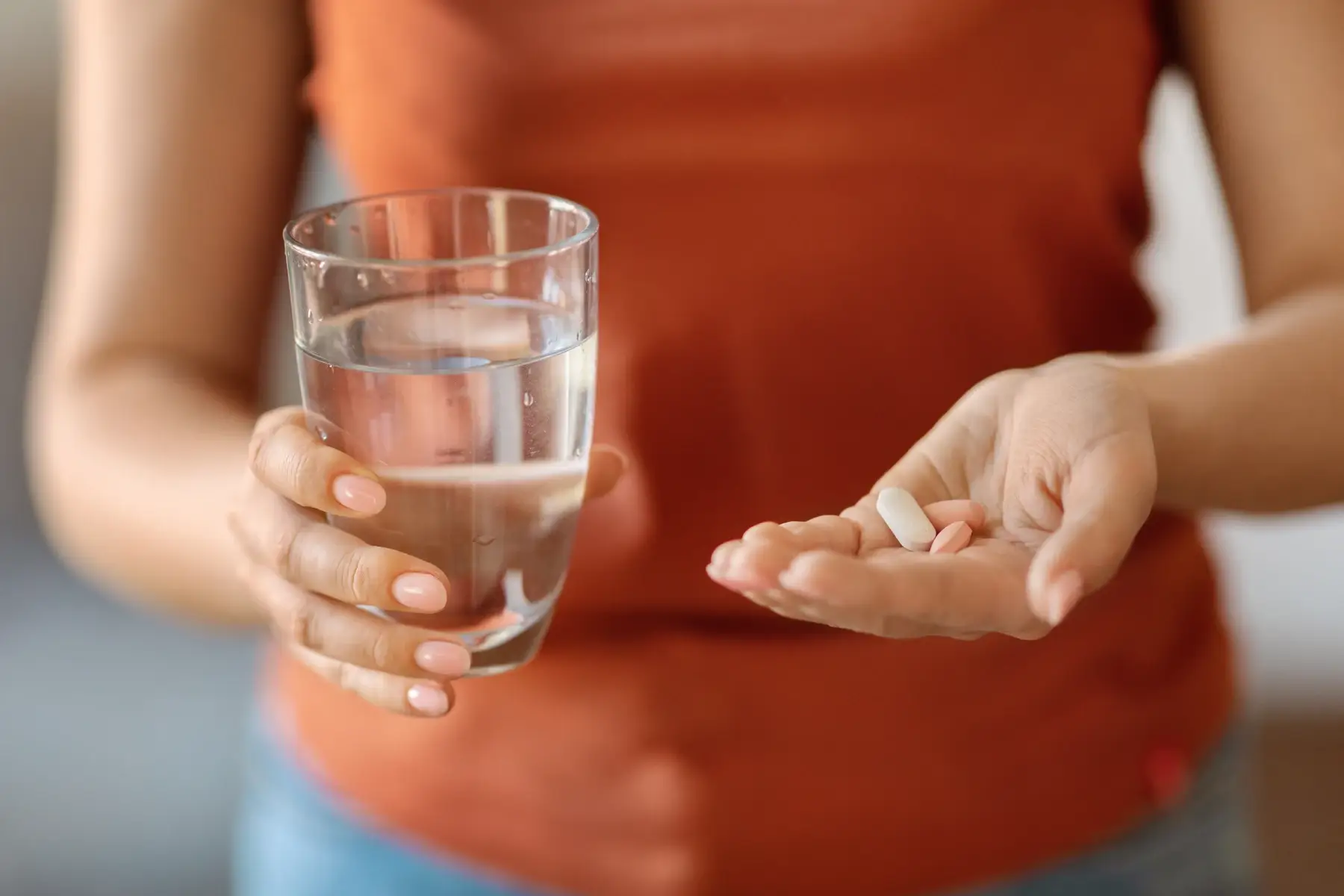 Woman taking medication